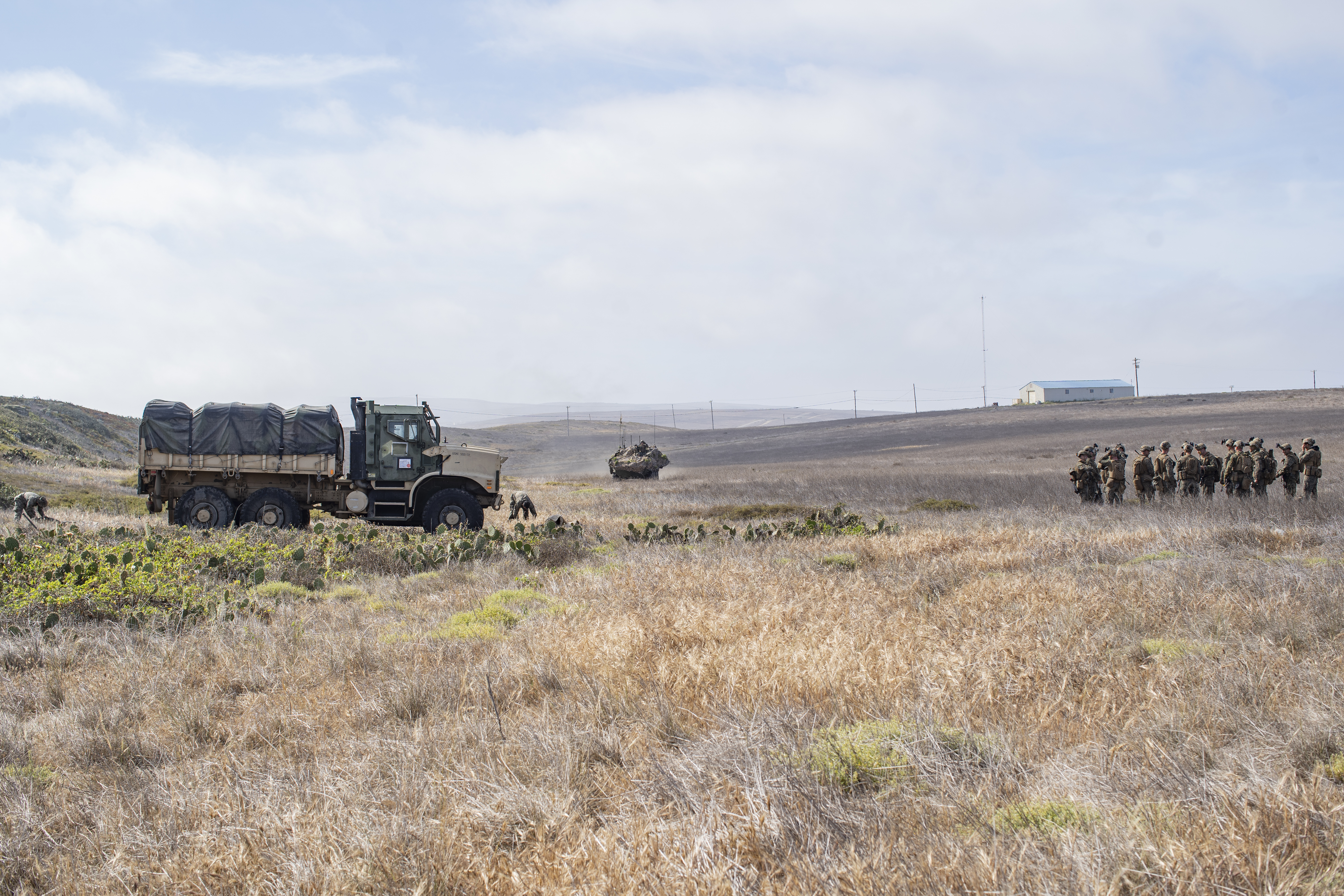 This is an image of Marines and tactical vehicles at San Clemente Island.